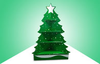 Πράσινη επίδειξη παλετών χαρτονιού χριστουγεννιάτικων δέντρων για την προαγωγή των παιχνιδιών, ευδιάκριτο σχέδιο